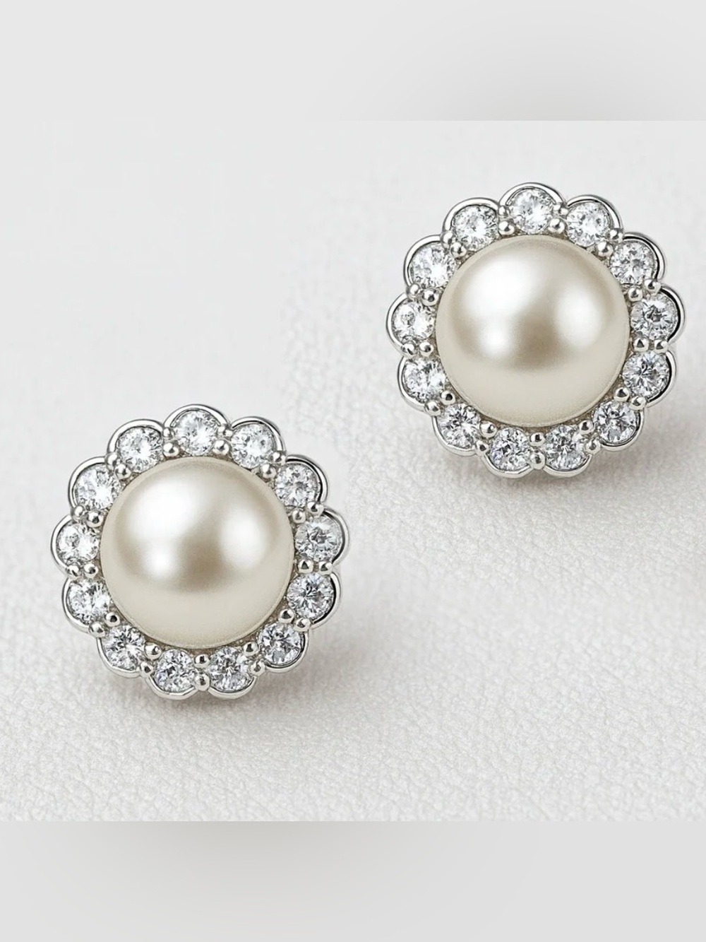 Sterling Silver Halo Pearl Studs. NWT.